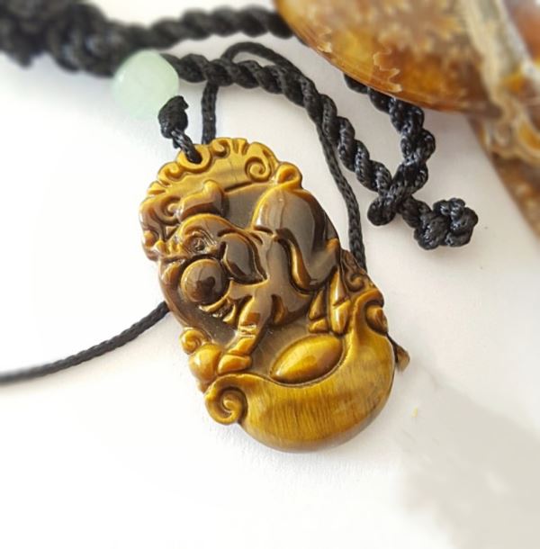 Mặt dây chuyền tuổi hợi đá mắt hổ M999-13